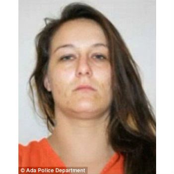 Busted: Christie Dawn Harris, 28, was hiding a loaded gun in her vagina and bags of crystal meth in her ass.