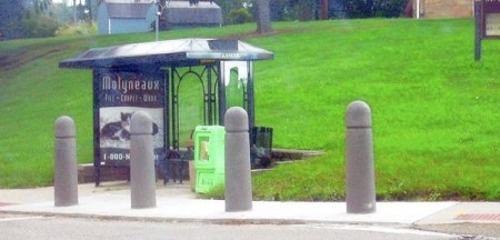 PITTSBURGH POST GAZETTE--Bollards at a bus stop in a suburb of Pittsburgh.