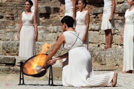 Greek actress Ino Menegaki lights the Olympic flame at a ceremony at the Temple of Hera, marking the beginning of its 123-day relay from Greece to Sochi for the 2014 Winter Olympics. (Flicker/International Olympic Committee) 