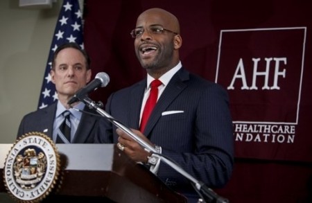 Assemblymember Isadore Hall III, sponsor of AB 1576, is watched by his biggest fan, AHF dictator Michael Weinstein