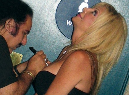 Ron Jeremy signs Shelley Lubben's breast